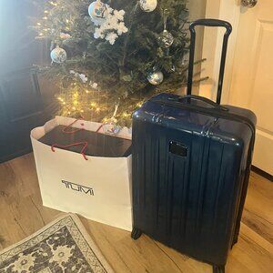 TUMI 22" Navy Blue International Expandable 4 Wheel